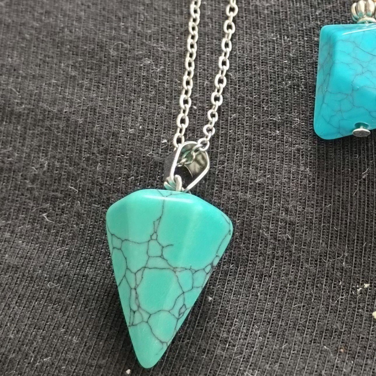 Green and blue turquoise cone pendant on a silver chain with turquoise earrings